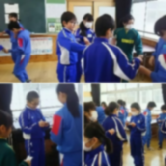 体操服の児童たちが向かい合って話して交流をしている複数の写真