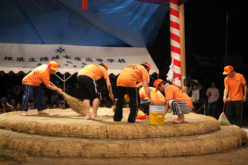 Staff tending to the ring